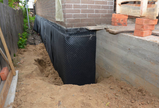 SJ Waterproofing Pros technician performing targeted Basement Waterproofing assessment in Mount Royal, NJ